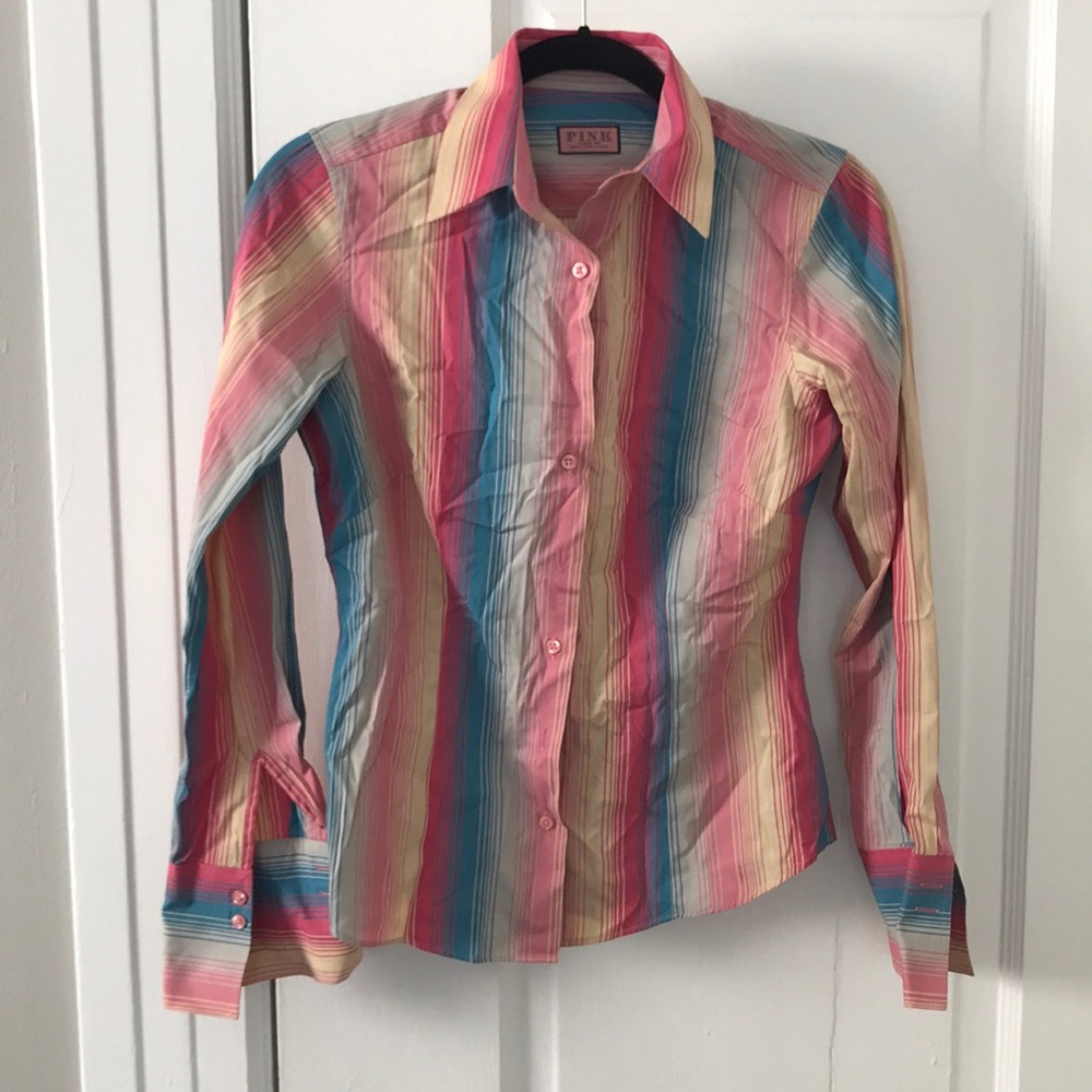 PINK button down shirt.